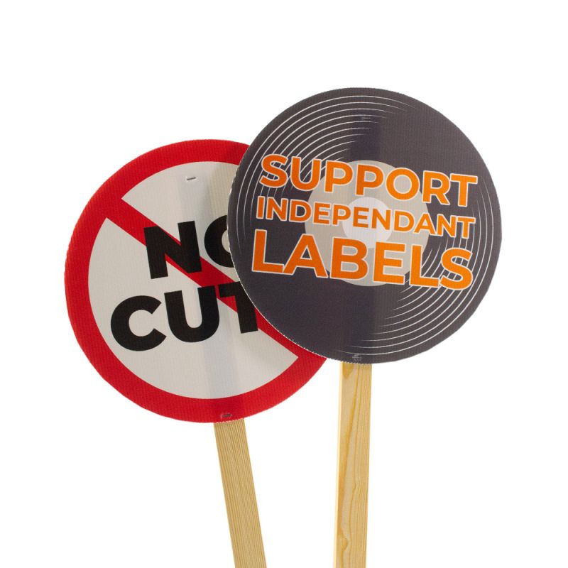 Two printed Correx Boards cut to circles attached to a wooden stick to create a placard